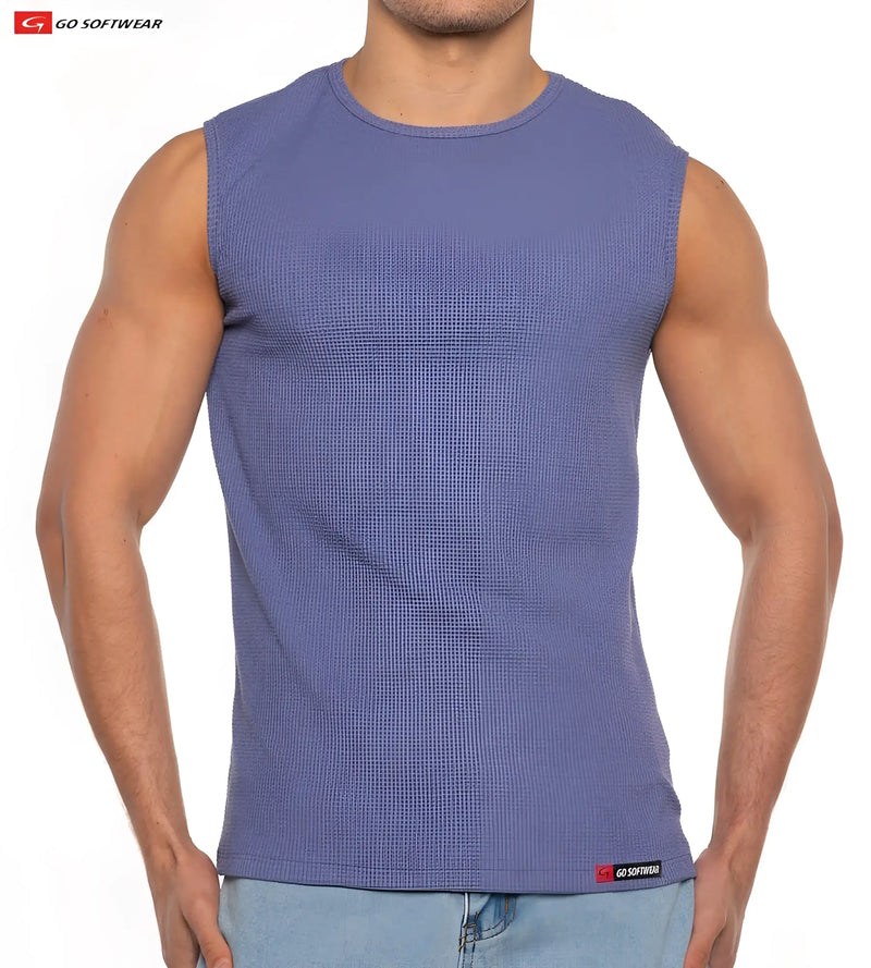 Gold Coast sleeveless tee is a men’s medium blue ribbed knit top with a round neckline and go softwear label at hem
