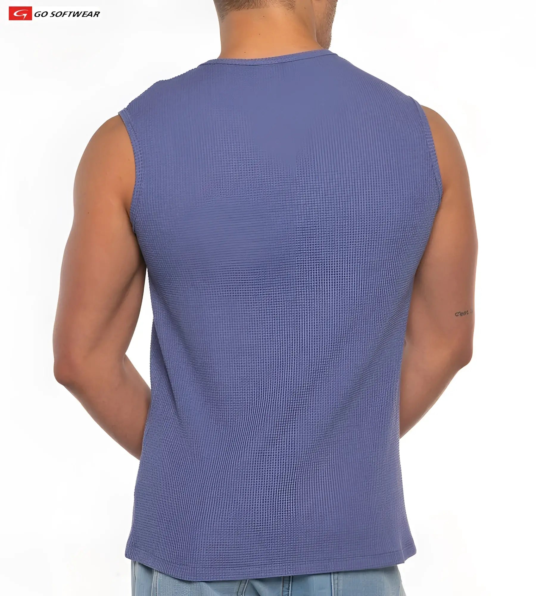 A men’s sleeveless waffle-knit gold coast tee in medium blue with a round neckline and tailored fit