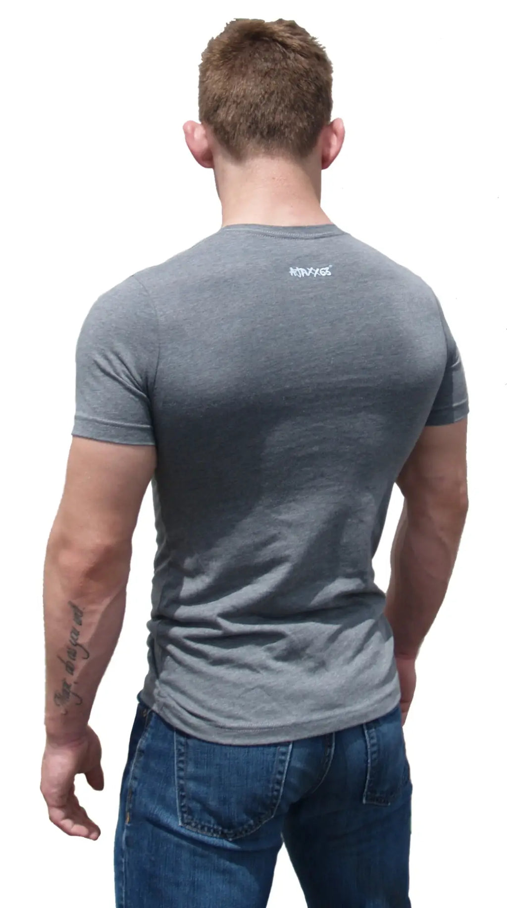 Back view of a gray heathered cotton t-shirt with a small white kinhag logo on the back neckline premium heather