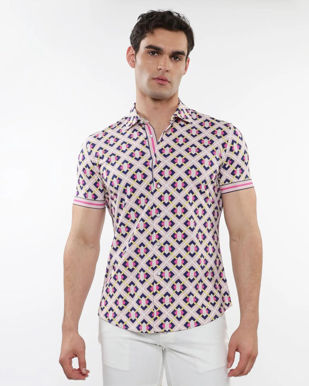 A man wearing a grid parquet printed performance short-sleeved shirt with pink purple and beige geometric patterns