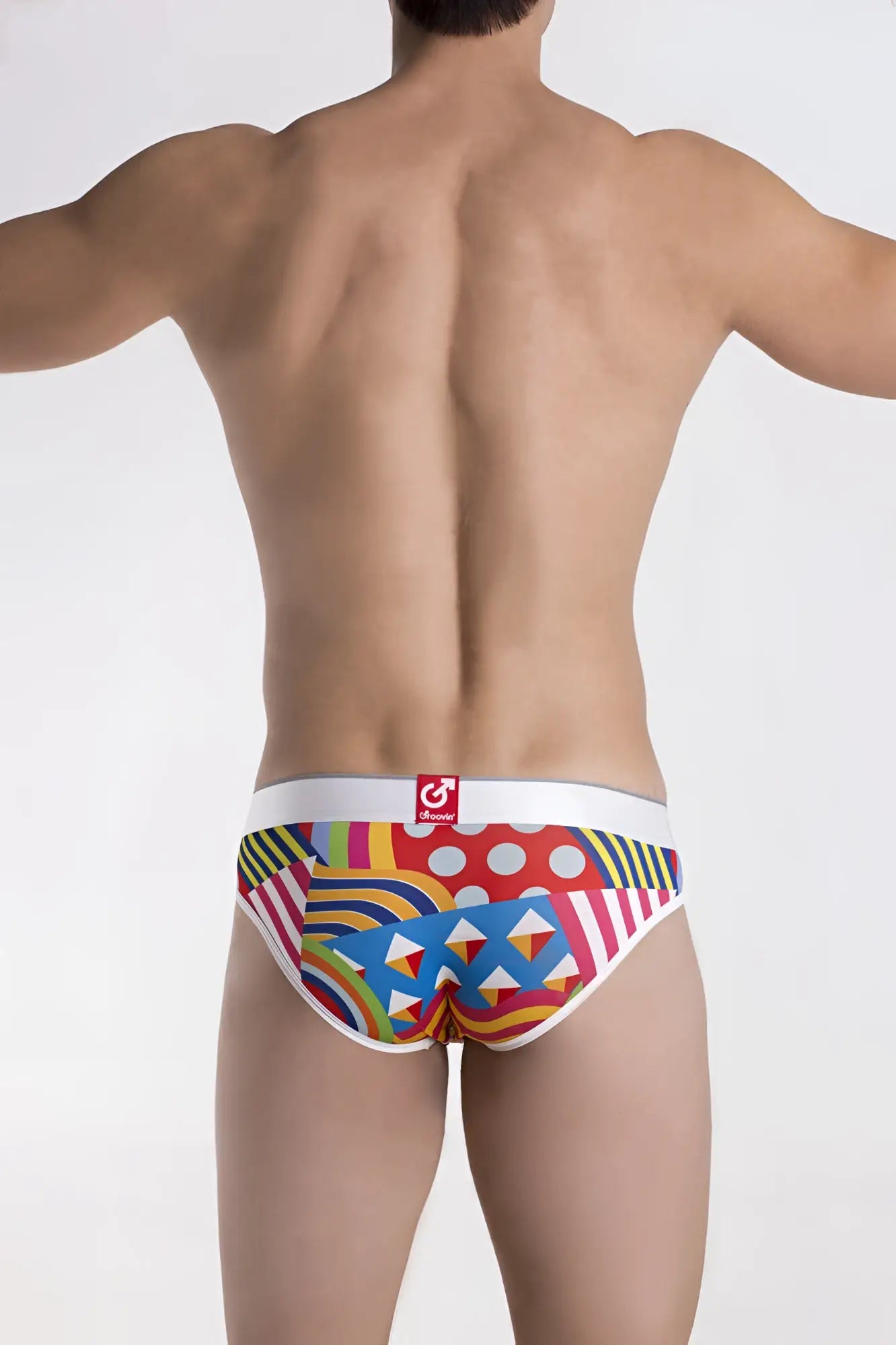 Vibrant geometric patterned groovin underwear pop art hip brief in red blue yellow and green with honey logo waistband