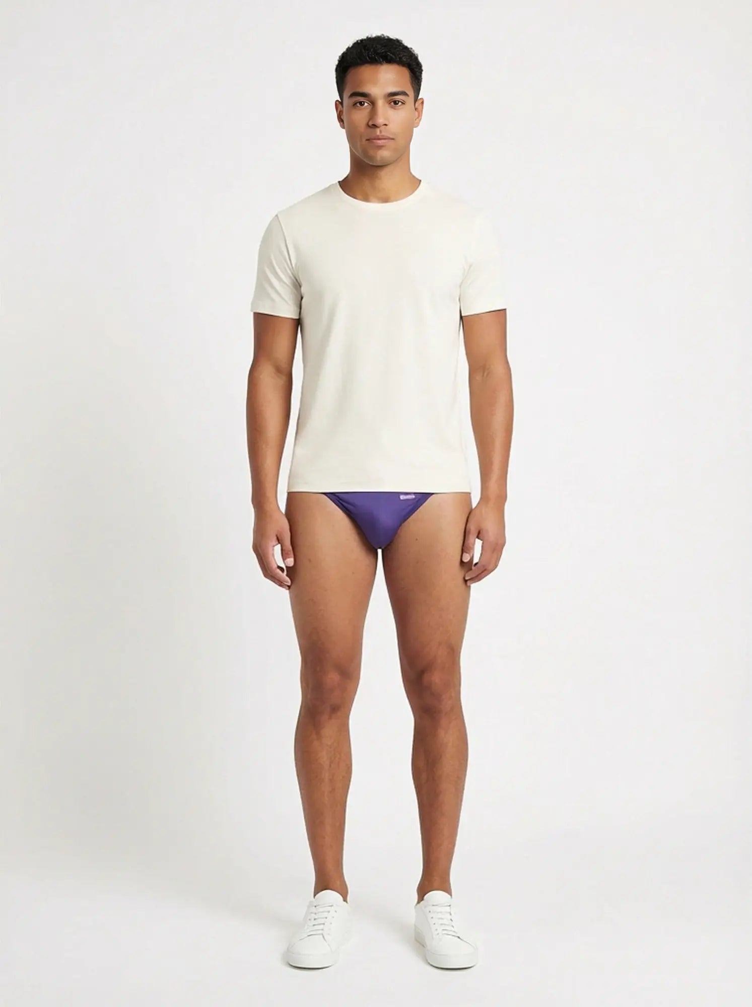 Purple string bikini briefs with subtle logo on waistband groovin underwear indigo purple st0103 front view