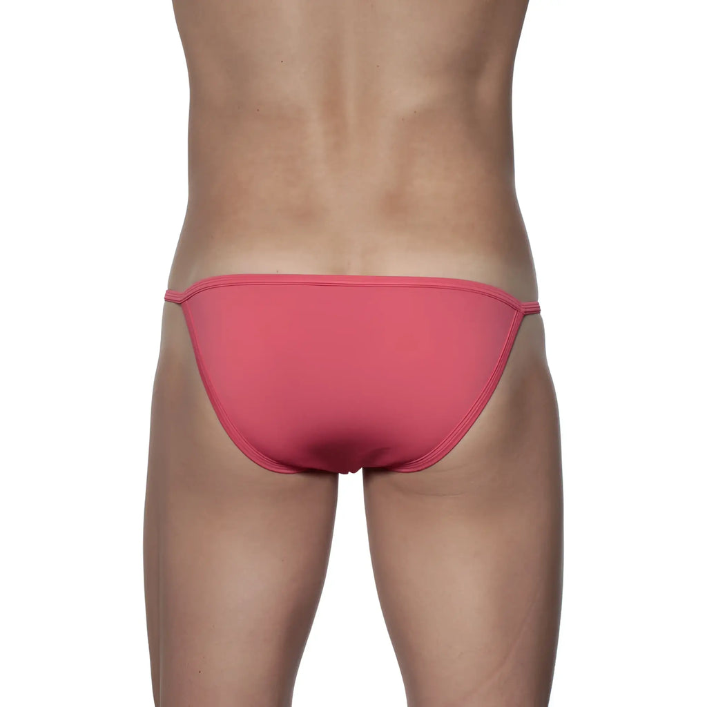 Groovin string bikini rouge red swim trunks in coral pink with smooth fabric and thin side ties for a sleek fit