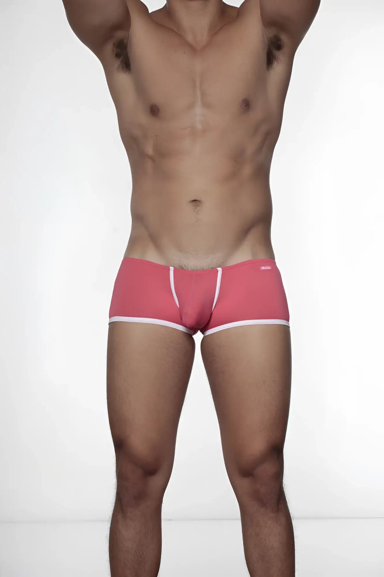 Pink groovin underwear super extra low cut boxer briefs with white trim and brand logo on waistband in rouge red