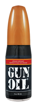 A sleek black silicone gun oil bottle with a glossy orange cap labeled gun oil for firearm lubrication
