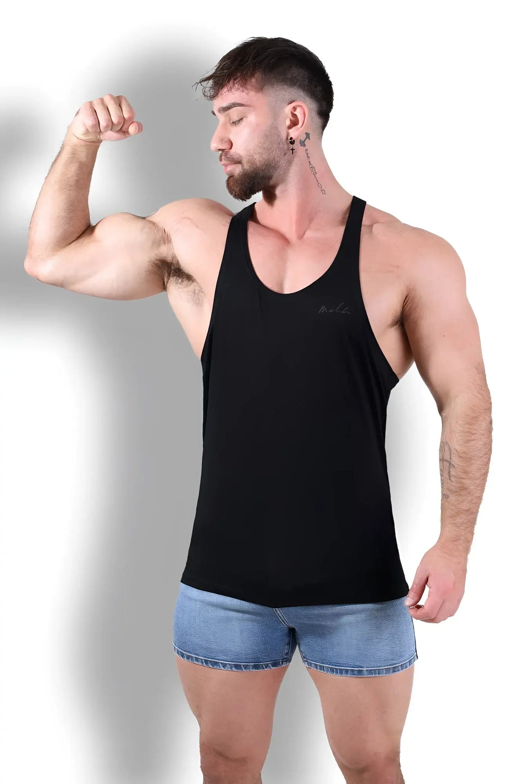 Black sleeveless gym bae classic workout stringer tank top with subtle embroidered logo on left chest for exercise