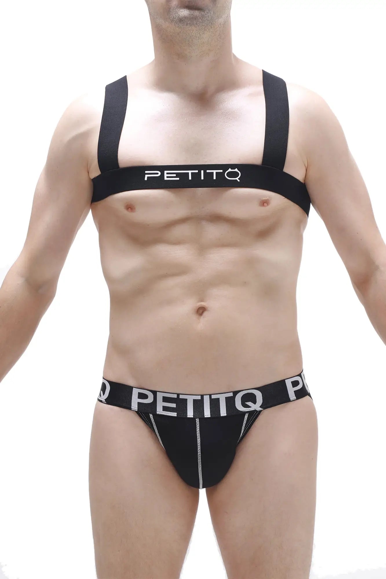 Black petitq athletic supporter harness ancille black with white lettering and zipper detailing visible from front side