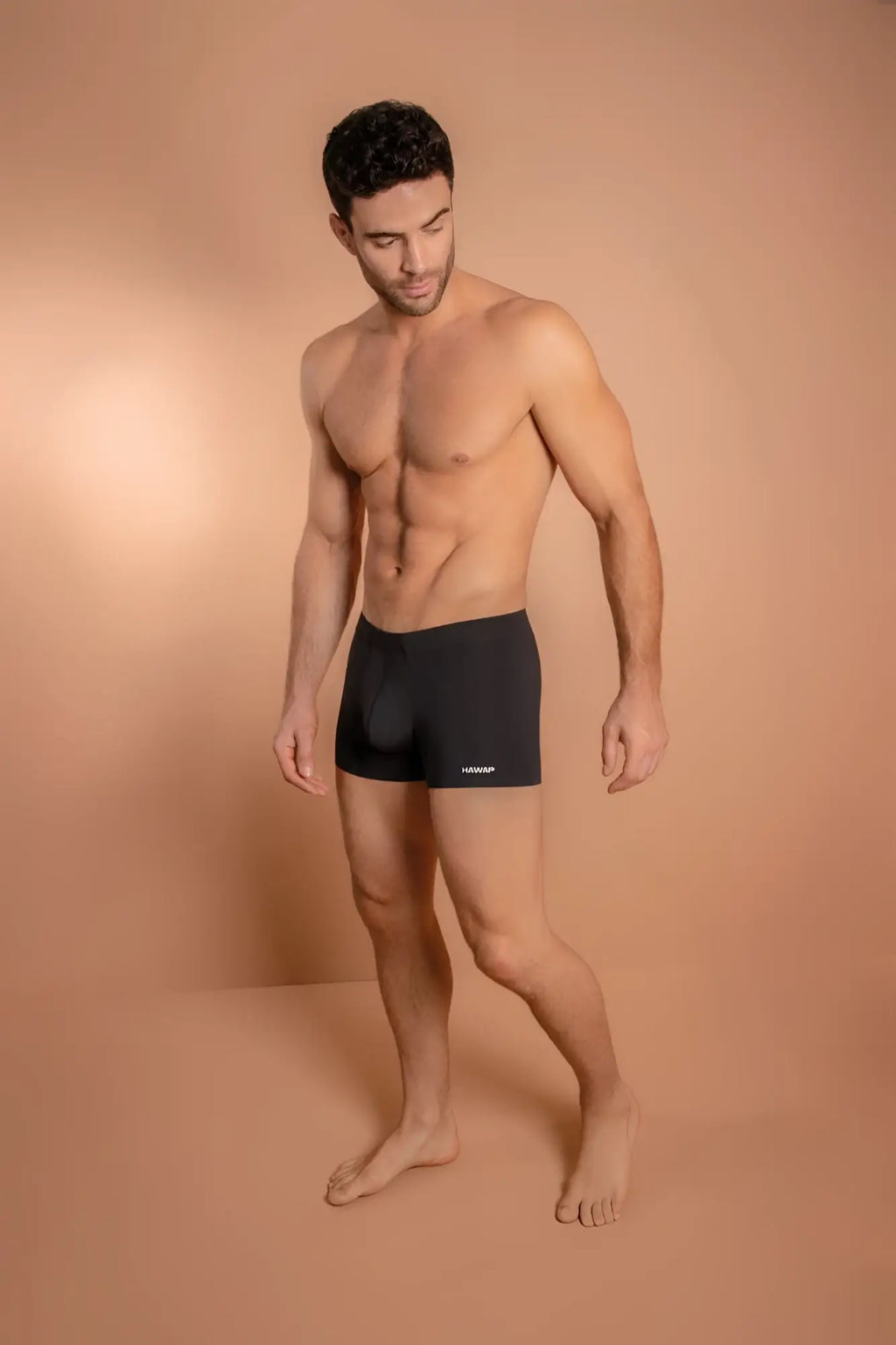 Black microfiber men’s briefs hawa 42222 with subtle logo on lower left leg in black color
