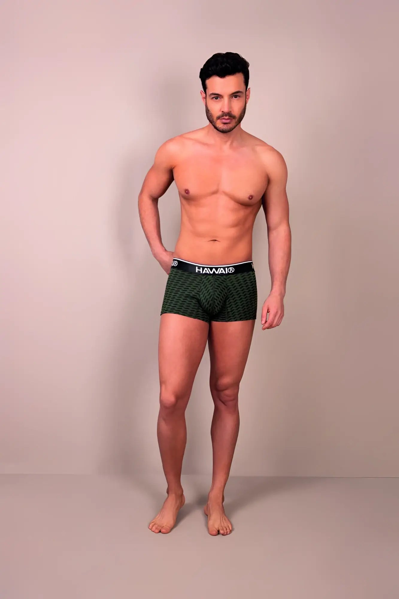 Dark green patterned boxer briefs with black waistband featuring hawa logo in printed trunks color green design