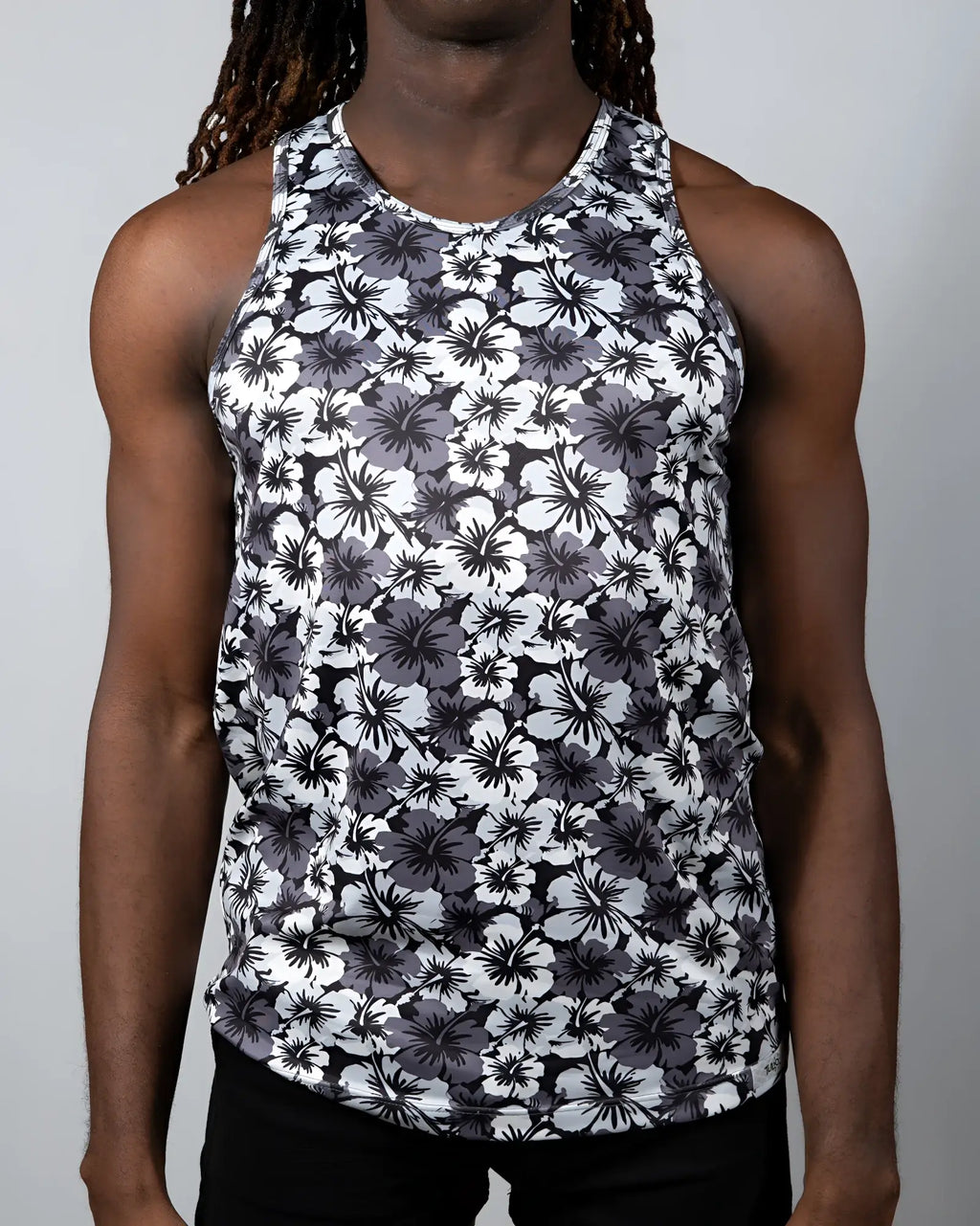 Black and white floral patterned hawaiian hibiscus print tank top with round neckline in lightweight fabric