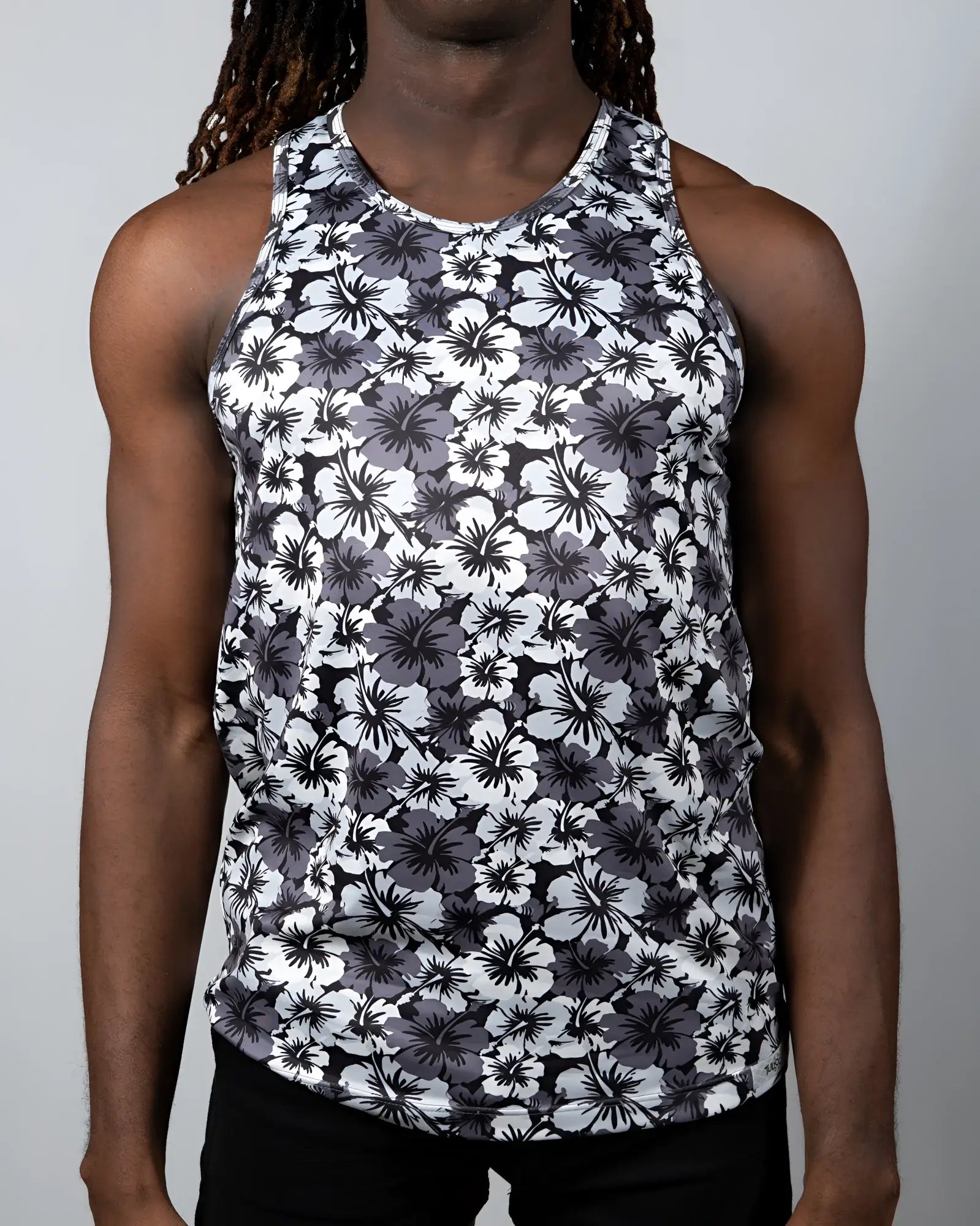 Black and white floral patterned hawaiian hibiscus print tank top with round neckline in lightweight fabric