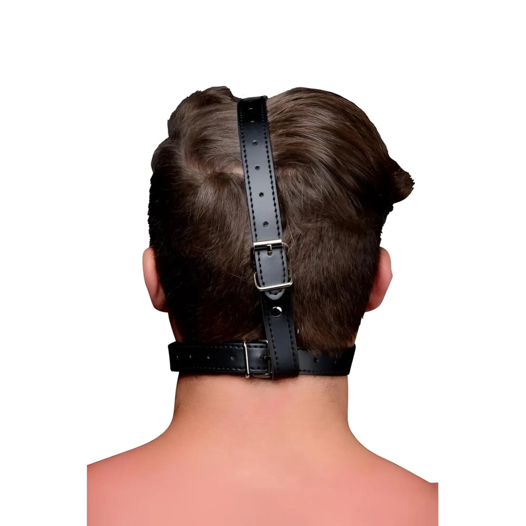 Black leather head harness with ball gag featuring silver metal buckle and adjustable holes for secure fit