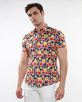 A vibrant men’s short-sleeved stretch knit shirt with red and yellow hearts on a navy blue background