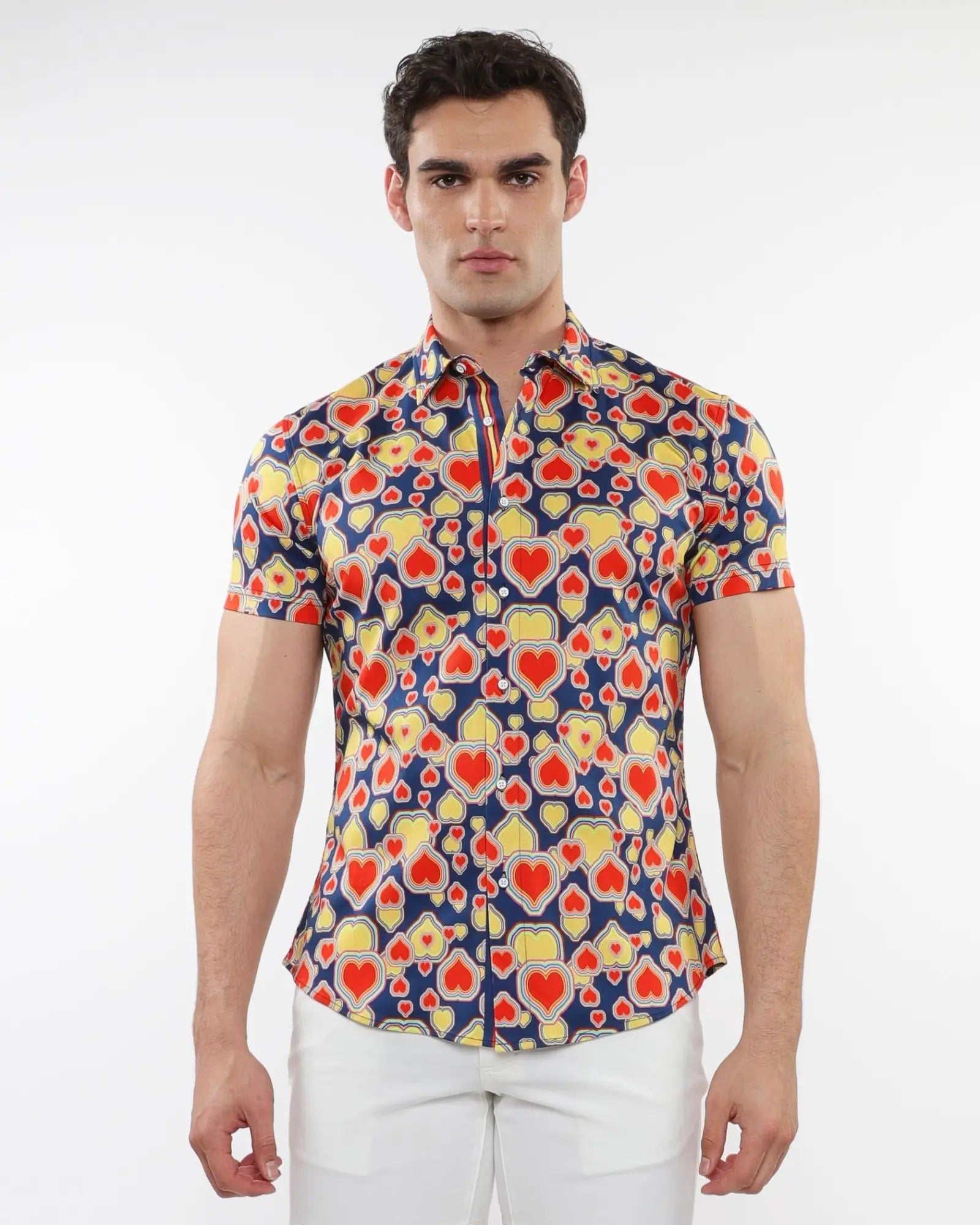 A vibrant navy blue hearts print stretch knit short-sleeved button-up shirt with red and yellow hearts