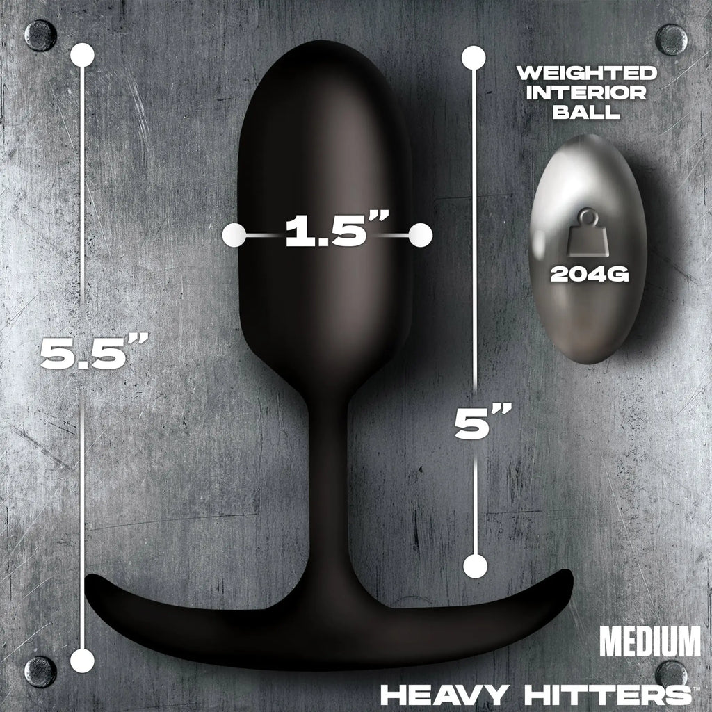 Heavy Hitters black silicone anal plug showing dimensions and internal 204g weighted ball on a metallic background.