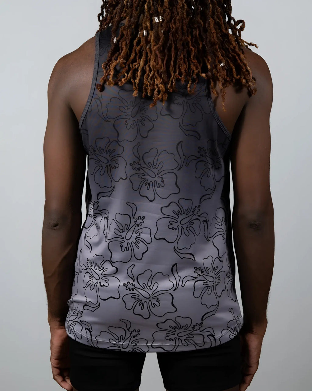 Gray tank top with black outlined hibiscus flower pattern from the hibiscus ombre print tank collection