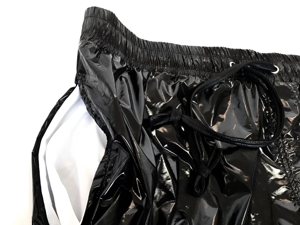 Black glossy nylon high gloss shorts with white inner lining and elastic waistband for comfortable wear