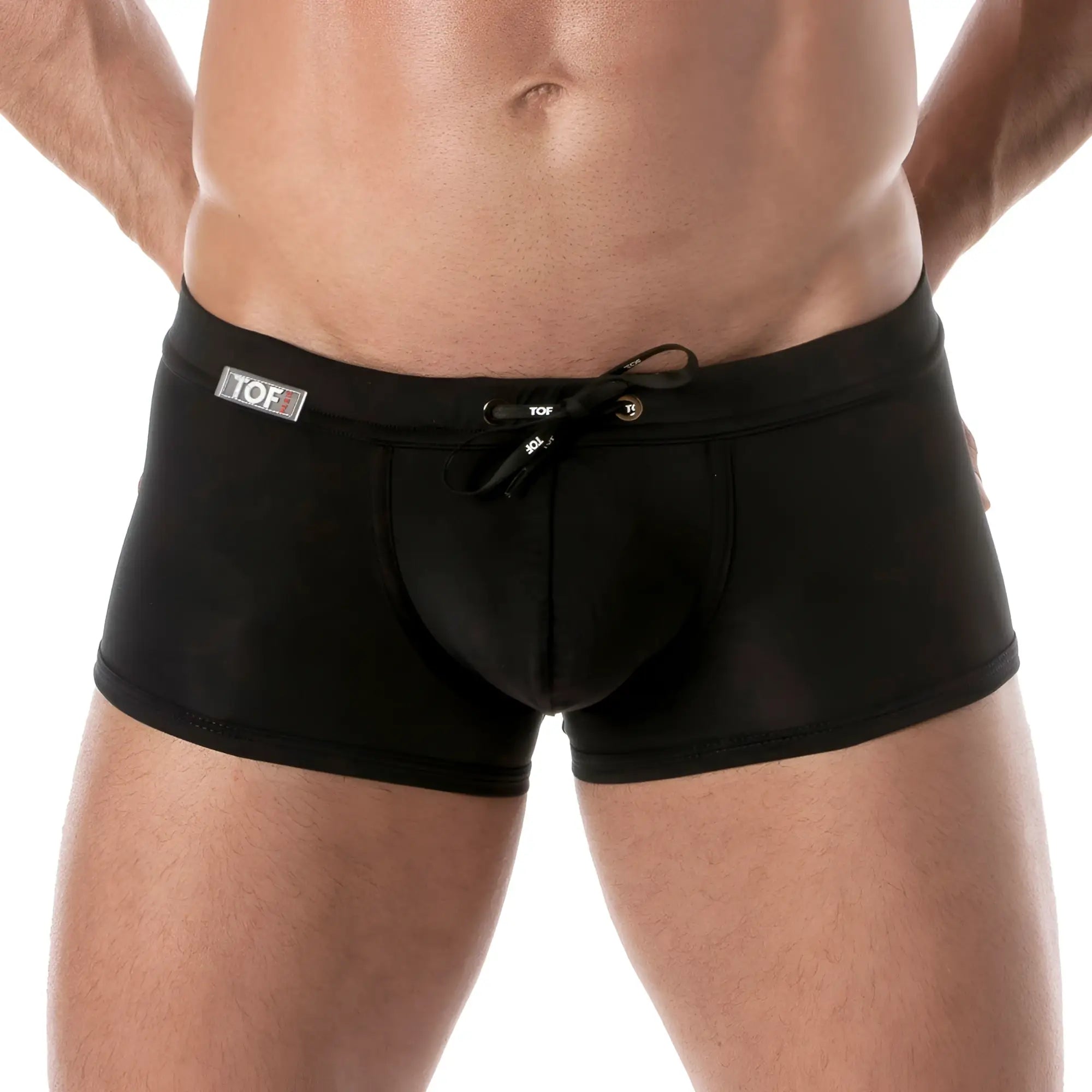 Black holidays swim trunk made of tof fabric featuring a drawstring waistband and subtle branding for swimming