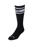 Black ribbed hookd up sock with white striped cuff and stylized pig logo featuring sty pig branding on the toe