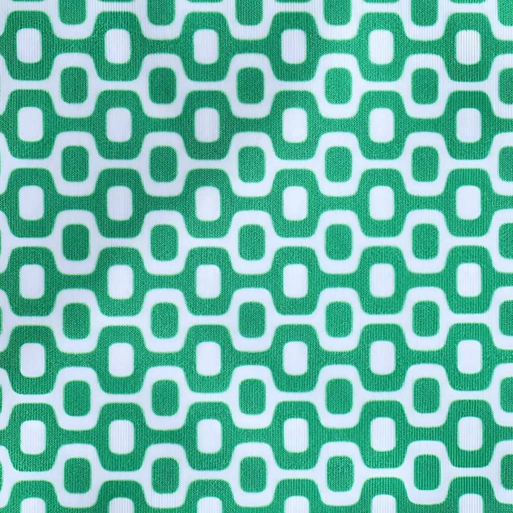 Green and white geometric patterned fabric on hortelã green solid men’s swimming sunga for beachwear use
