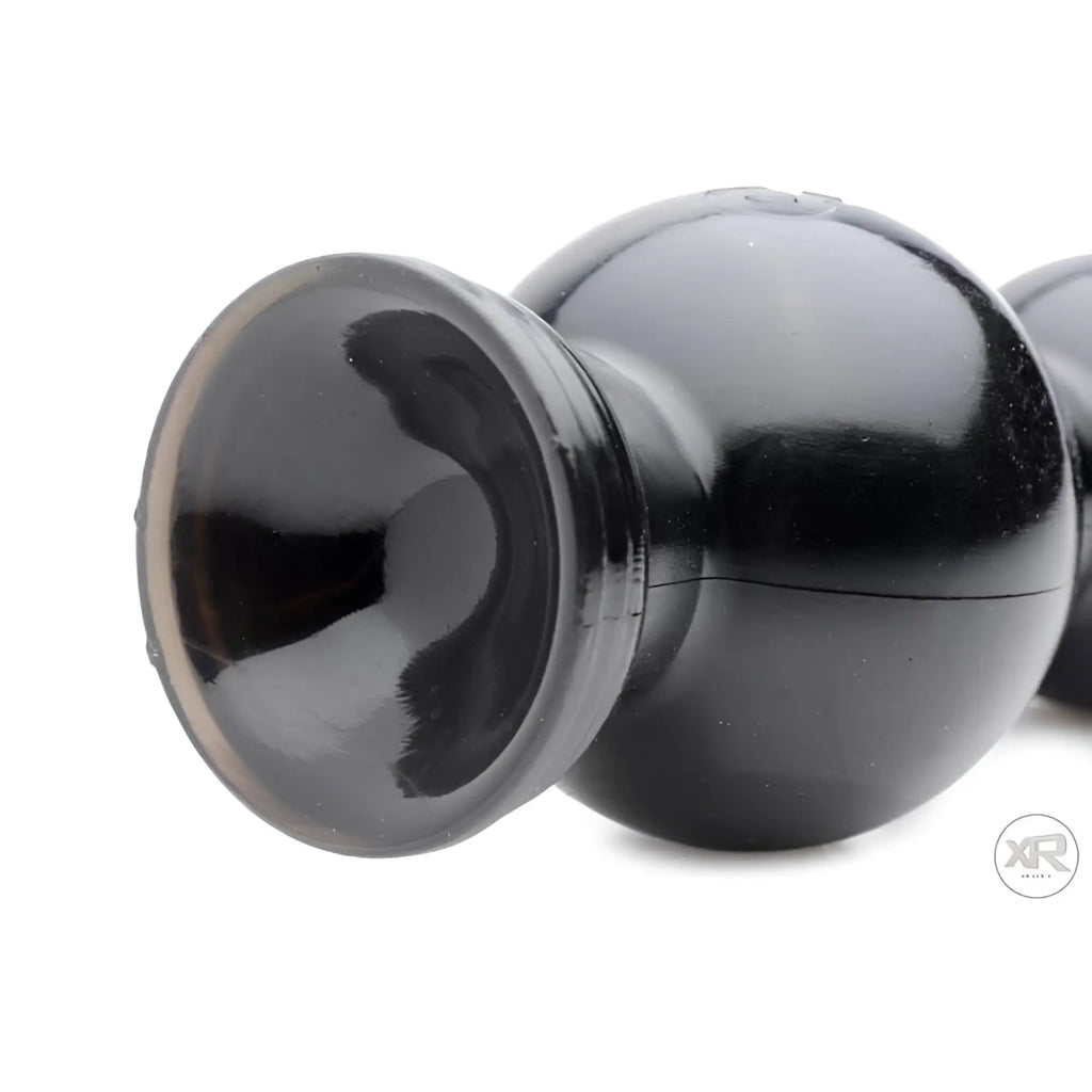 Hosed 19" black graduated beaded anal snake featuring a flared base for safety against a white background.