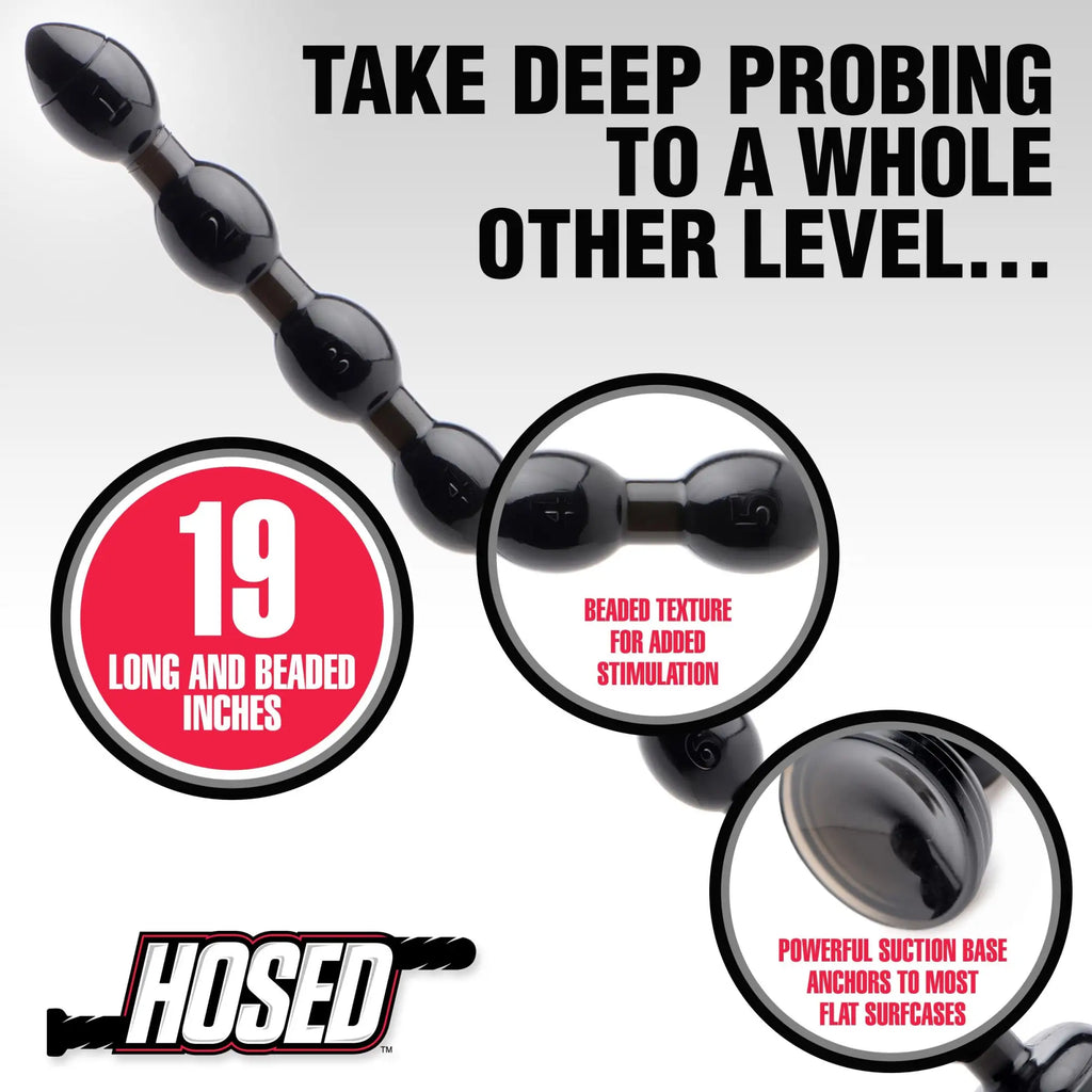 Hosed 19-inch black beaded anal snake with textured beads and a suction cup base.