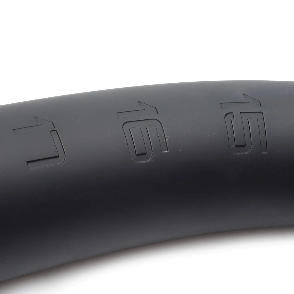 Close-up of a matte black Hosed Silicone Tapered Anal Hose featuring embossed measurement markings 15, 16, and 17.