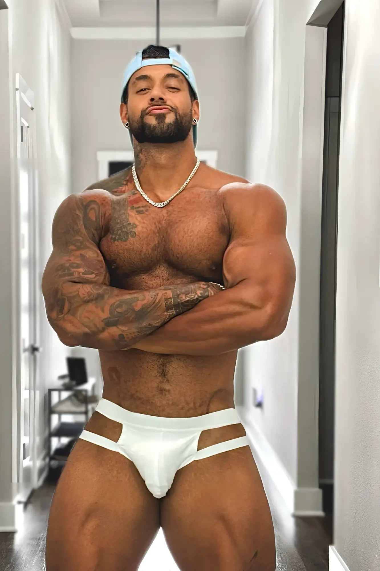 White athletic briefs with adjustable cut-out design in breathable fabric for host or travel use