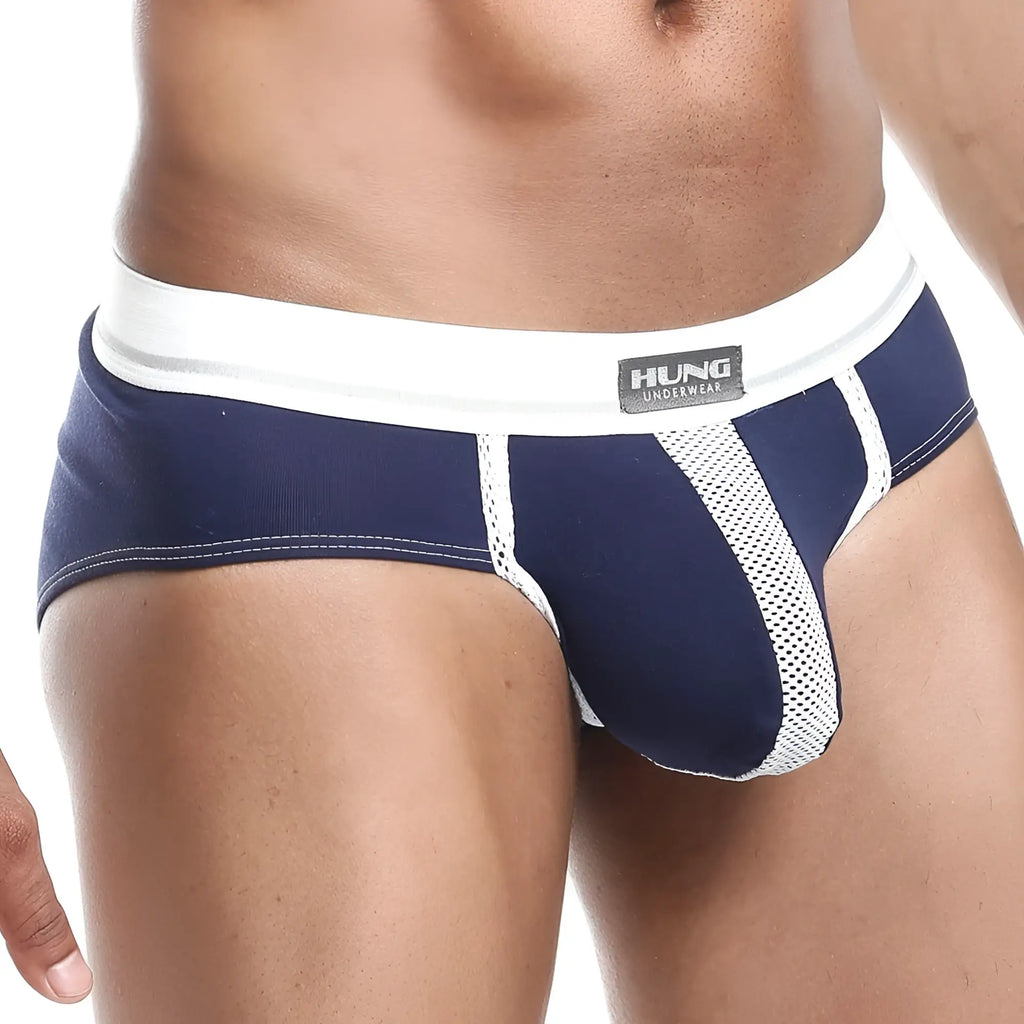 Navy blue and white mesh-trimmed men’s briefs with branded waistband hung hgJ009 race brief shown from front