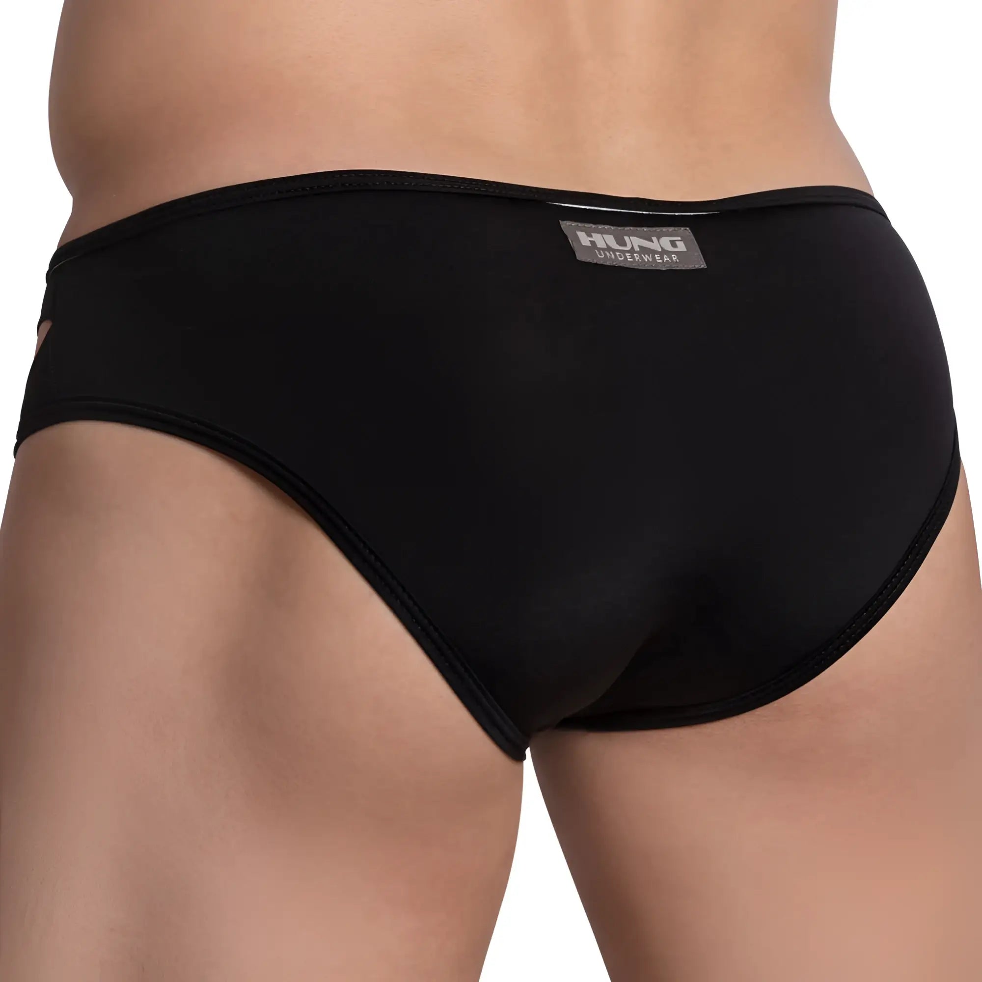 Black hung hgJ020 brief underwear with sleek form-fitting design and smooth fabric shown from the back side