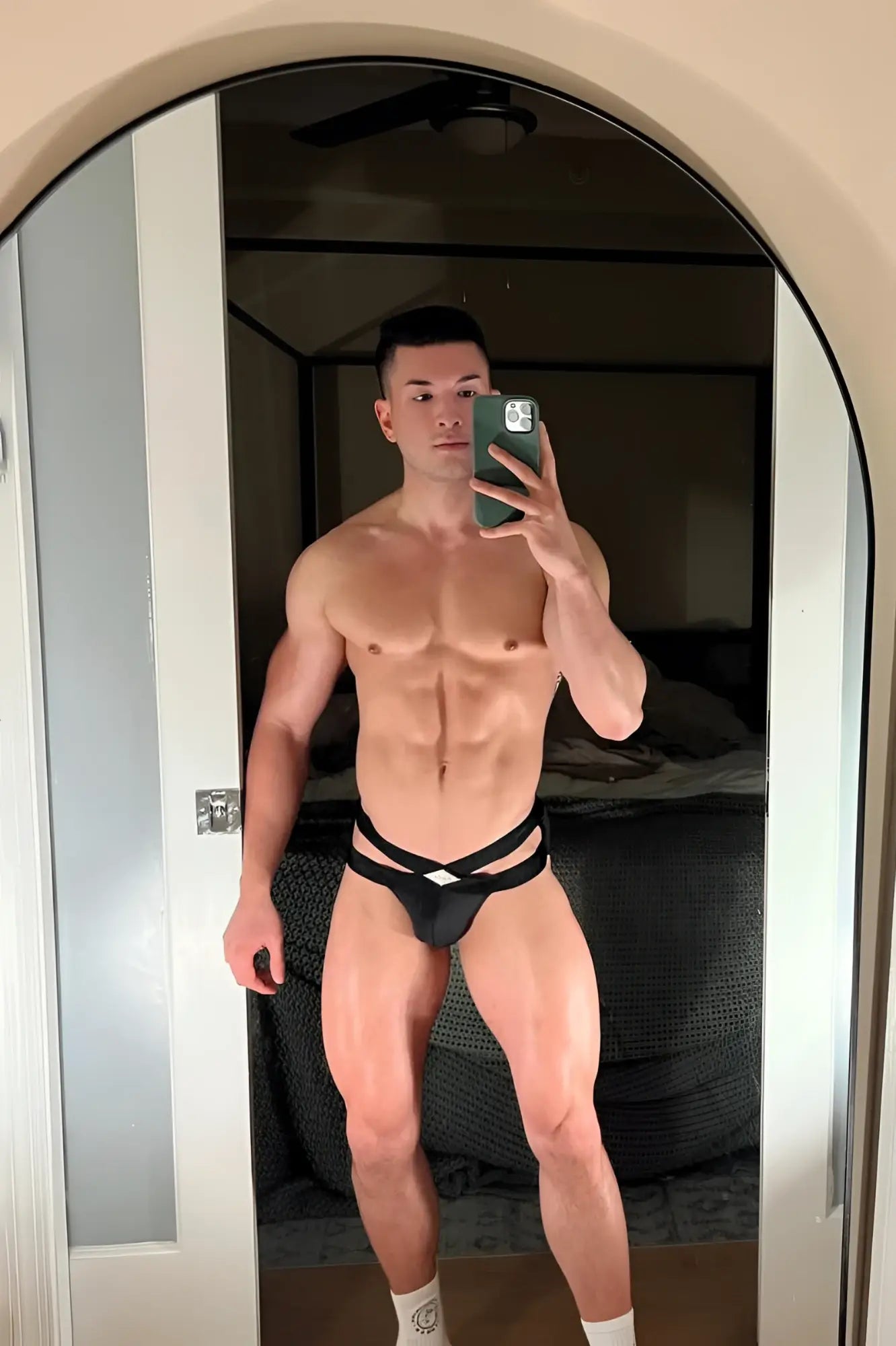 Black Hustler cross briefs with a distinctive front crisscross design made from soft athletic fabric