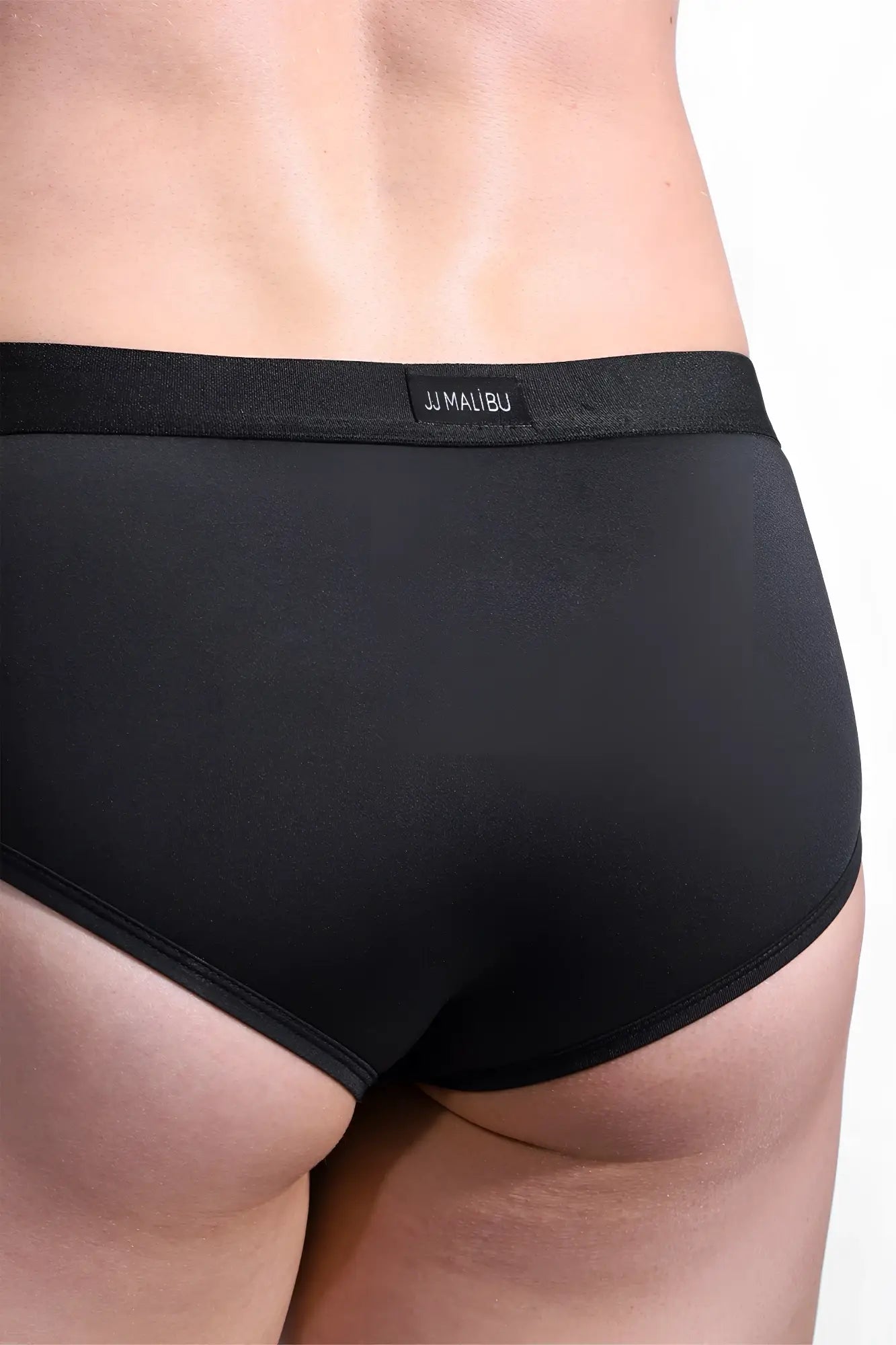 Hustler cross briefs obsidian black in smooth stretchy fabric with a snug fit shown from the back side