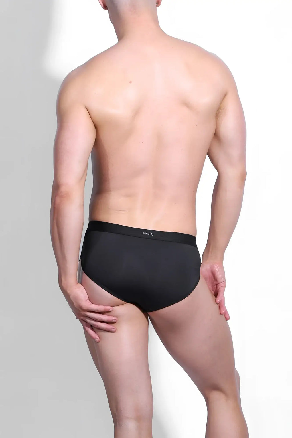 Black briefs hustler cross briefs obsidian black with slim form fitting design and subtle brand logo on waistband