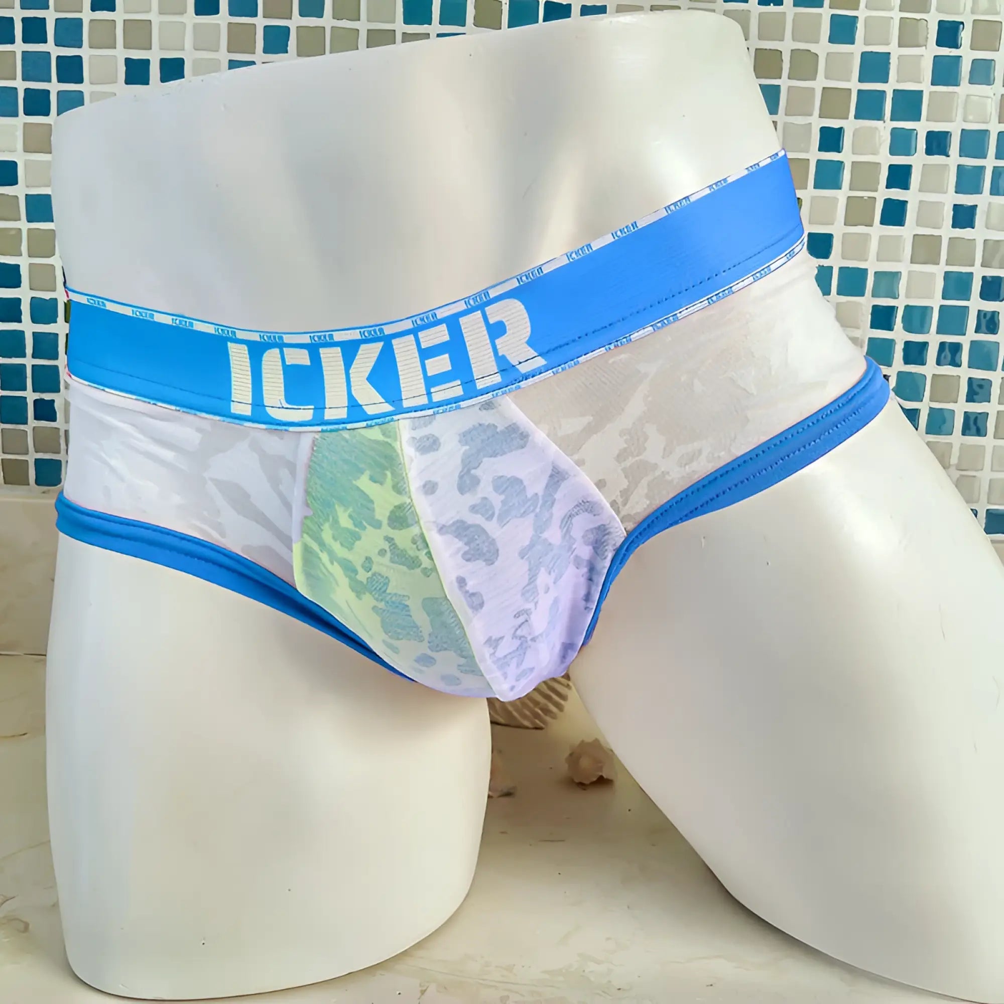 Icker sea acid mesh piping brief underwear in blue with white lace trim and a bold icker logo waistband