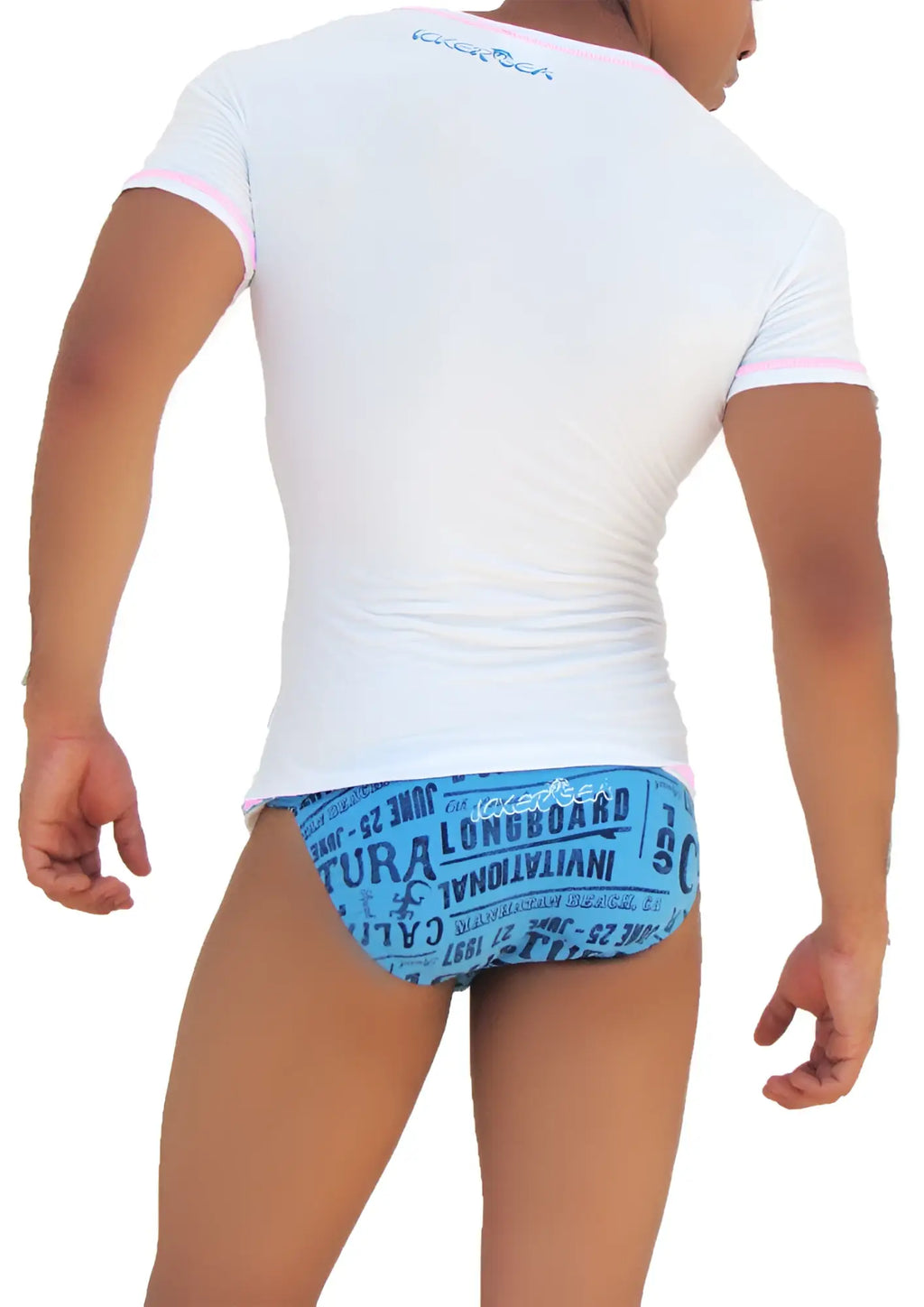 Back of icker sea white short sleeved rash guard with pink trim and blue graphic print for sun protection