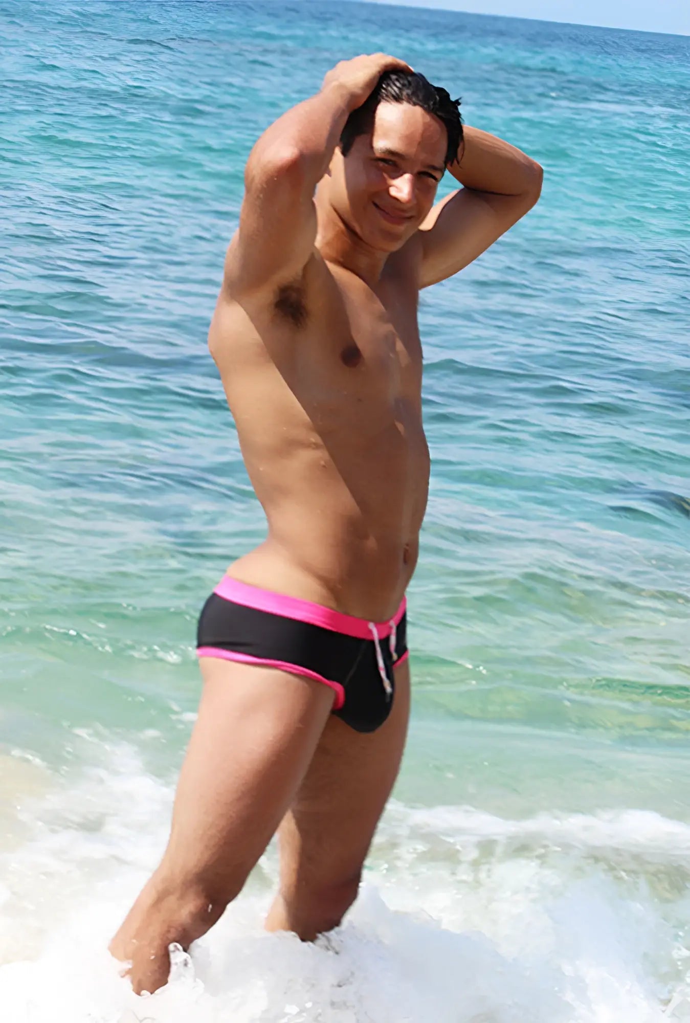 Black cheeky bikini swimwear trunks with vibrant pink trim and white drawstring by icker sea cob-15-39