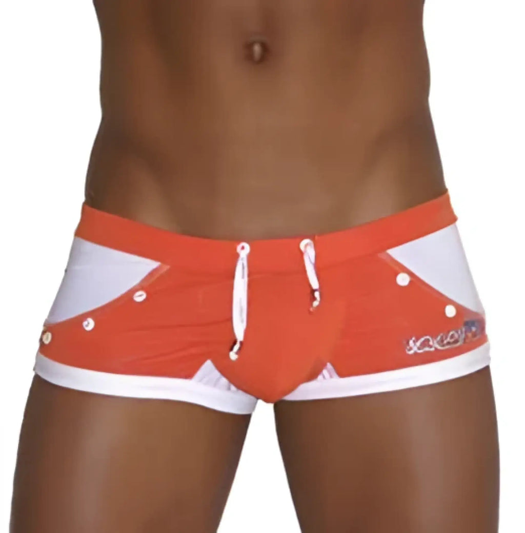 Icker Sea Eyelets square cut trunk swimwear in orange and white with bold geometric pattern and side brand logo