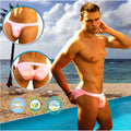 Pink icker sea men’s swim trunks showing the cheeky kiss my ass graphic on the back for casual beachwear
