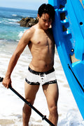 Icker Sea white swim trunks with black lace-up contrast and patterned trim square cut swimwear for men