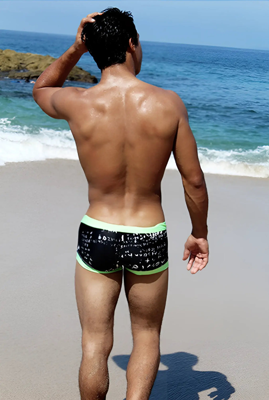 Black icker sea letters square cut trunk swimwear with white math equation pattern and bright green trim