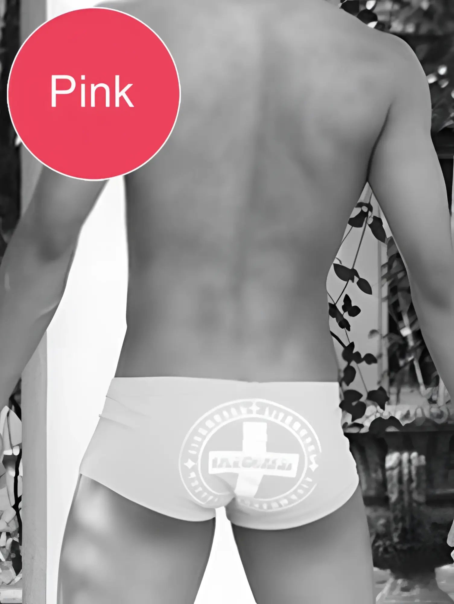 Pink icker sea lifeguard brazilian square cut trunk swimwear featuring a white circular logo with a cross
