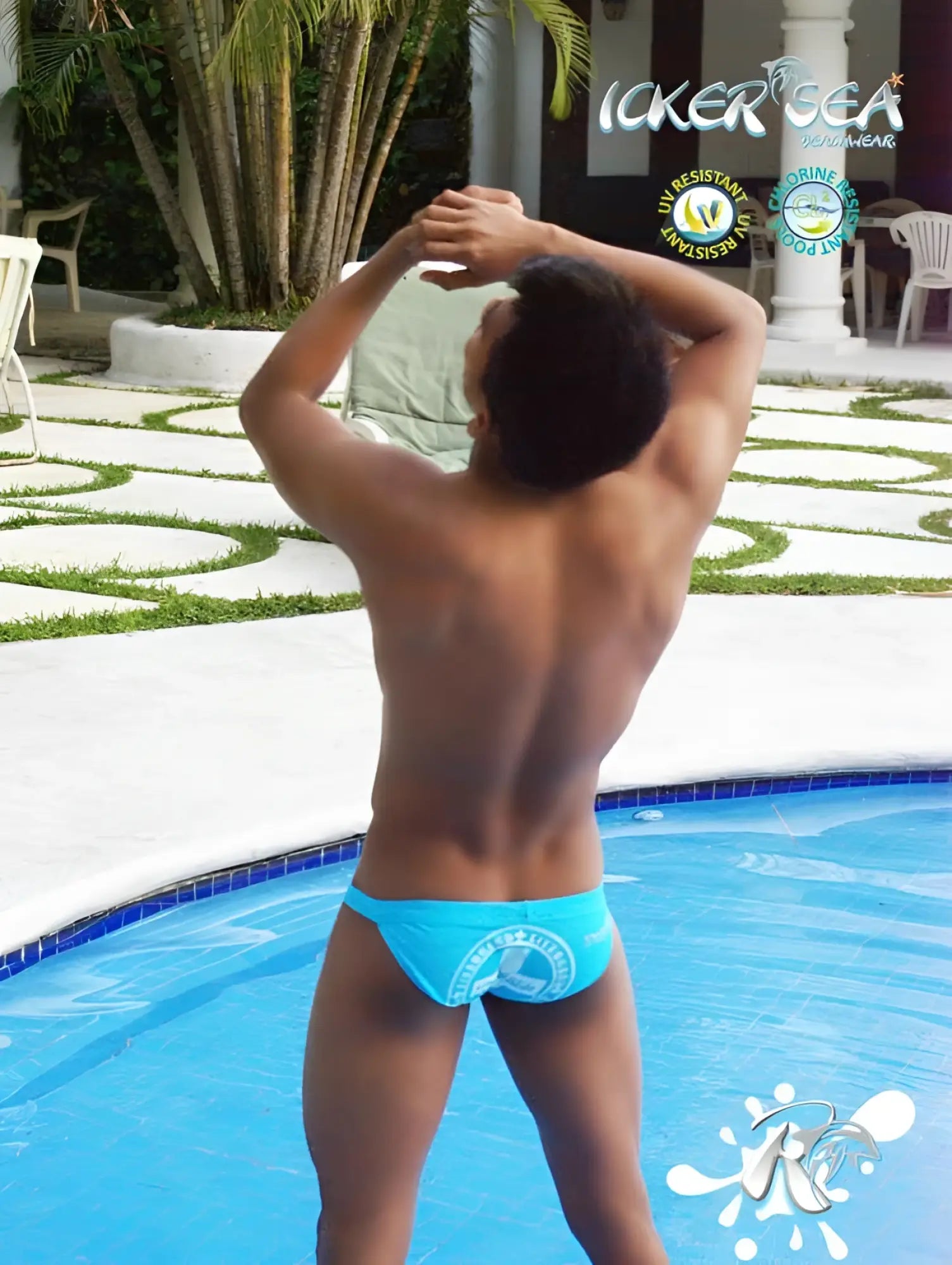 Bright blue icker sea lifeguard micro slip bikini swimwear showing back side with white logo on swim trunks