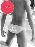 Icker Sea lifeguard slip bikini swimwear in pink with circular logo design on lightweight swim trunks