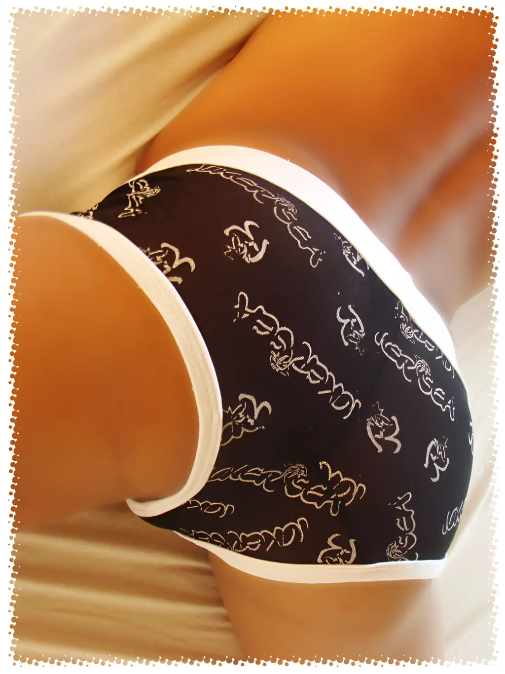 Black icker sea logo mesh lace front brief underwear with white trim and gold louboutin logo pattern