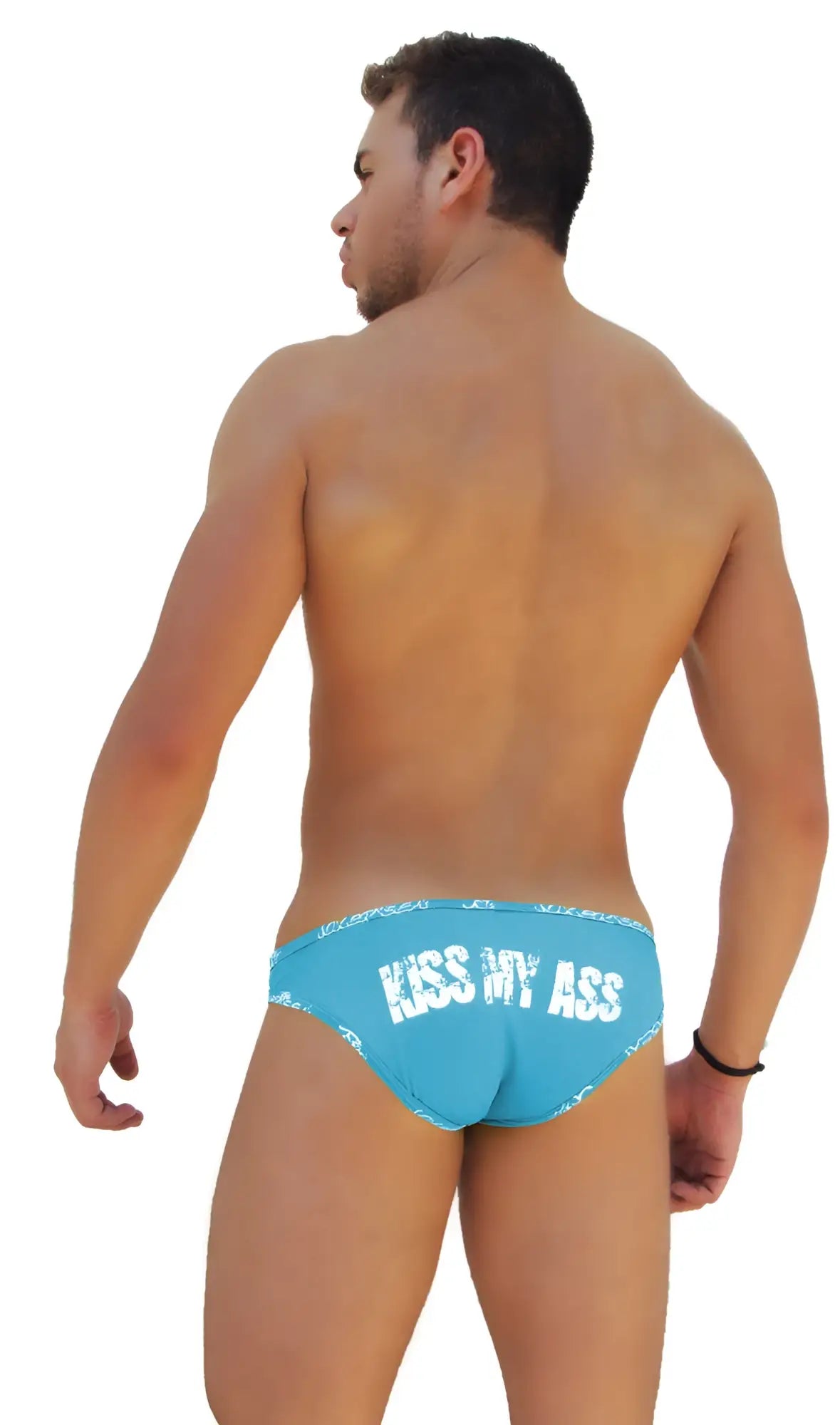 Back of bright blue icker sea logo trim kiss my ass slip bikini underwear with white text across the swim trunks
