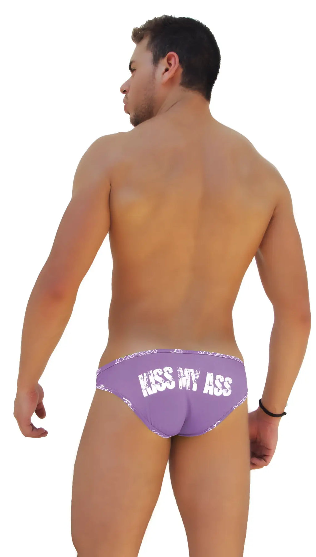 Back side of purple icker sea slip bikini underwear with white lace trim and kiss my ass text printed across the back
