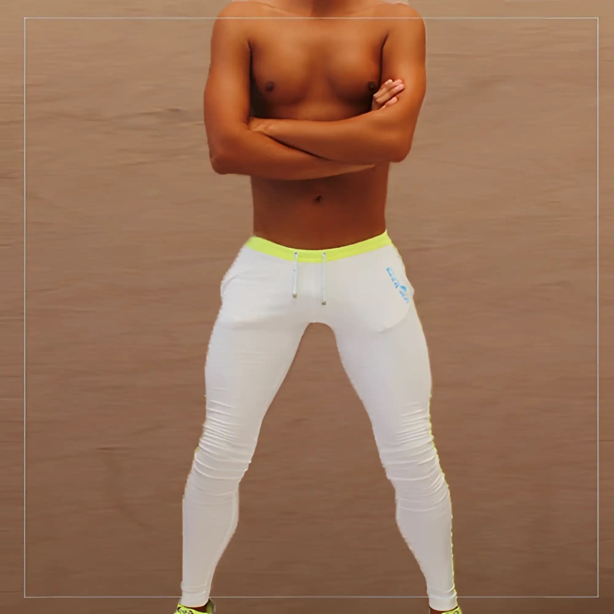 White icker sea side stripe runner pants with neon yellow waistband and subtle blue thigh logo for athletic wear