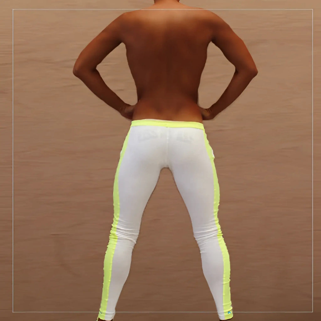 Icker sea side stripe runner pants in white with bright neon yellow side stripes designed for running and active wear