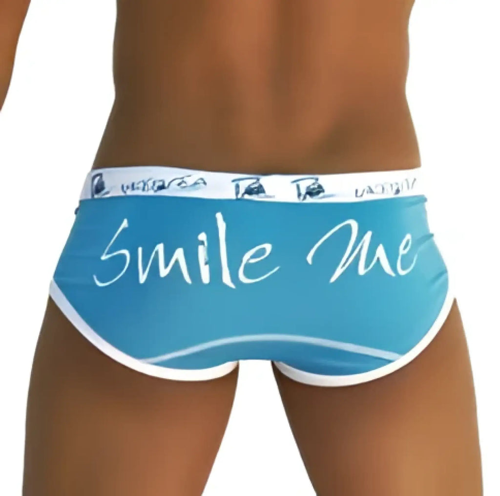 Light blue Icker Sea Smile Me brief underwear with white trim and cursive smile me text on front in snug fit design