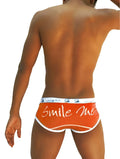 Icker sea smile me brief underwear orange with white trim and smile me cursive script on front